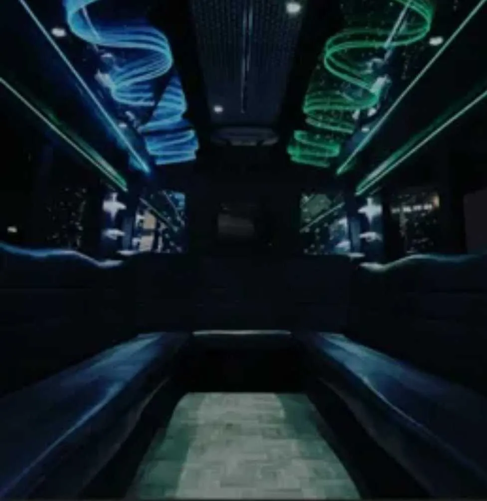 Black Party Bus Black Party Bus: seating area, with perimeter lounge seating and LED accent lighting