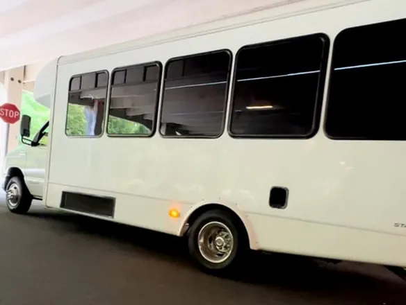 Ford E-450 Series Party Bus Ford E-450 Series Party Bus (white), with tinted windows