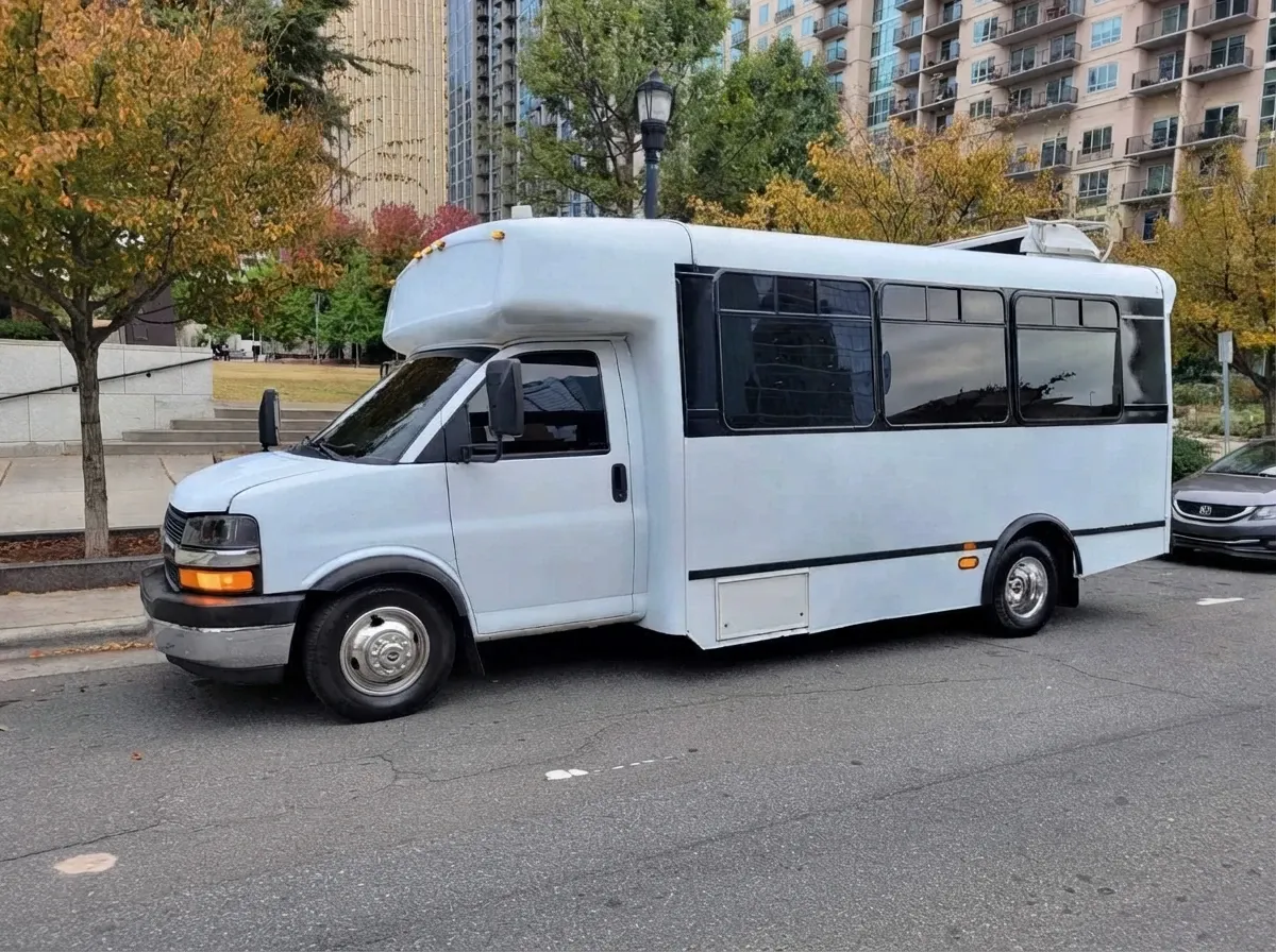 Chevrolet Party Bus (white) for booking