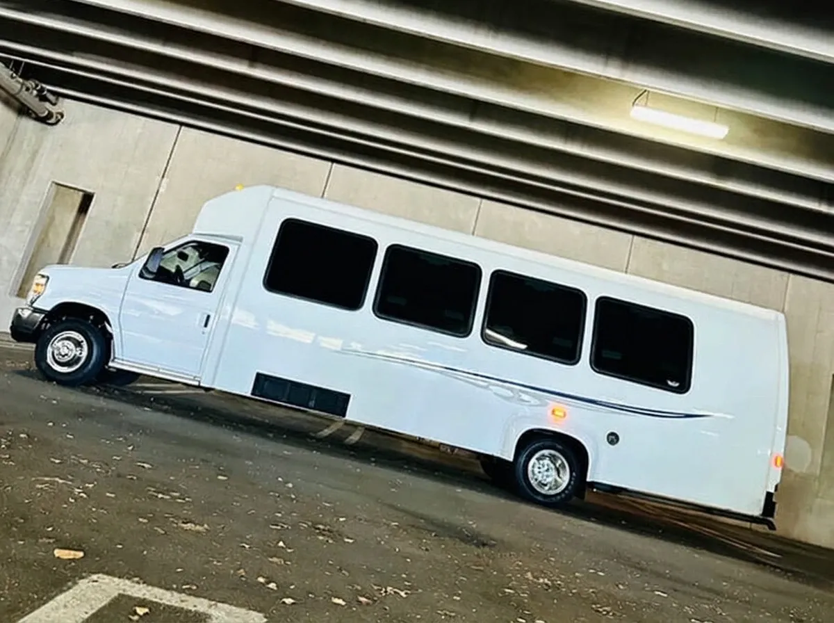 Ford E-450 Series Party Bus (white) for booking