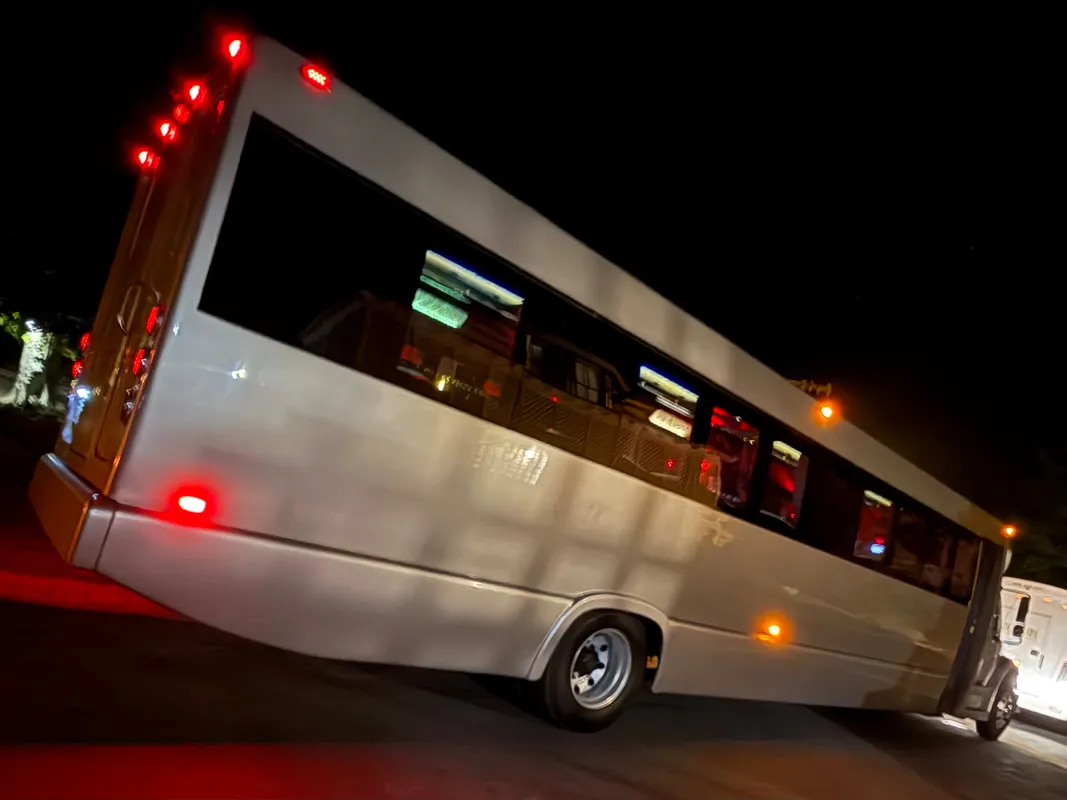 Freightliner Party Bus (silver): full view, with tinted windows