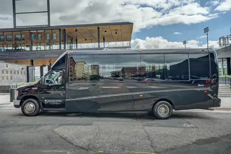 Grech Party Bus (black): full view, with tinted windows