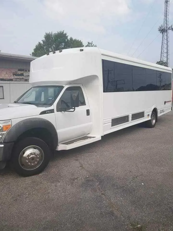 Limousine Bus (silver) for party bus rental: full view, with tinted windows, pic 3