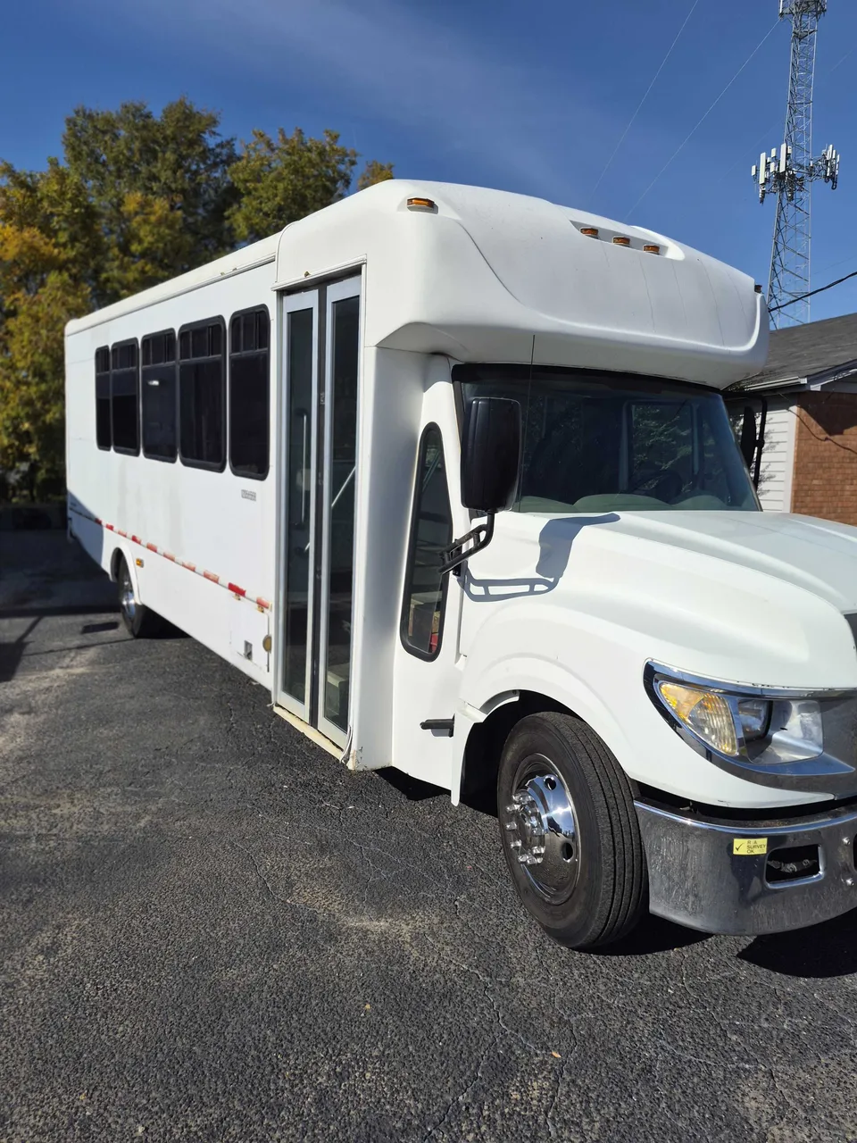 Limousine Bus (silver) for party bus rental: full view, with tinted windows, pic 5