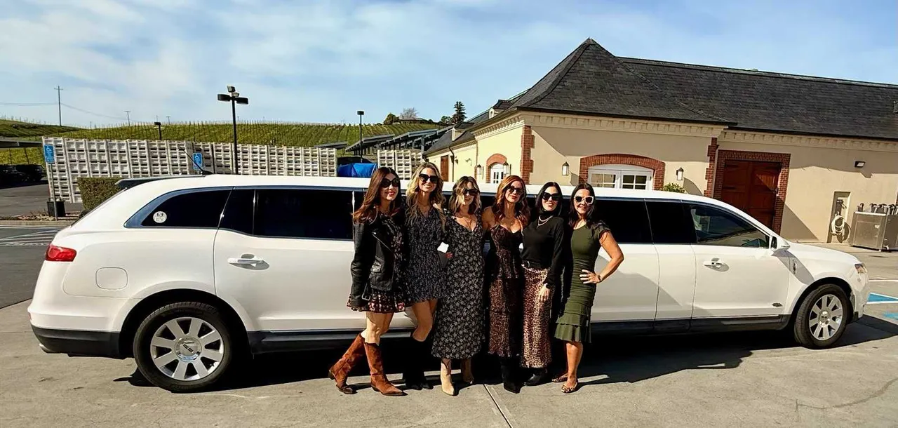 Lincoln MKT Limousine (white) for party bus rental: full view, pic 5