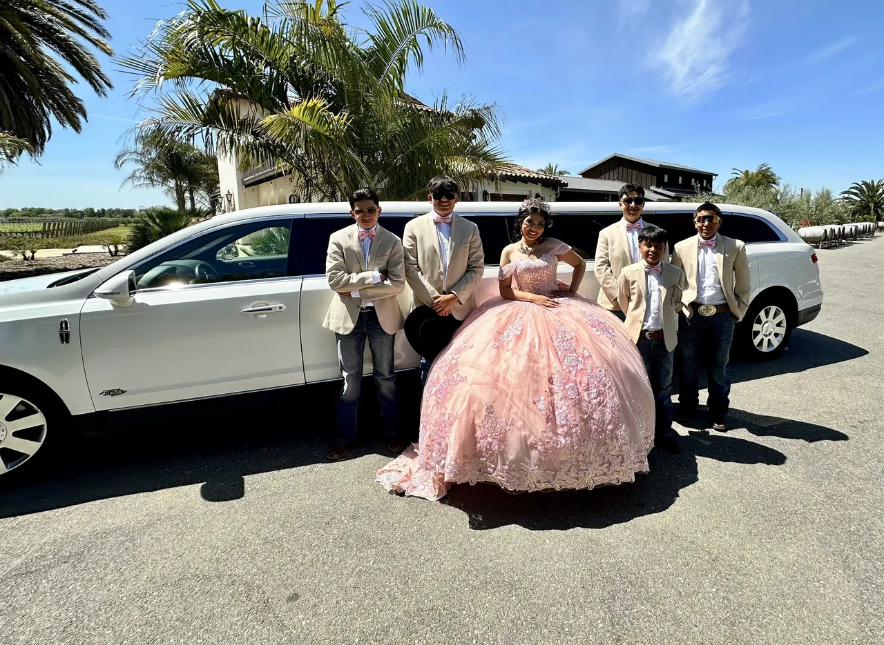 Lincoln MKT Limousine (white) for party bus rental: full view