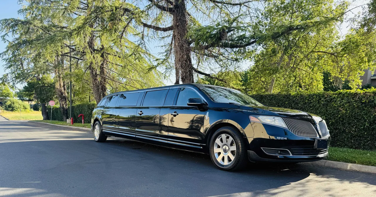 Lincoln MKT Limousine (black) for party bus rental, pic 2