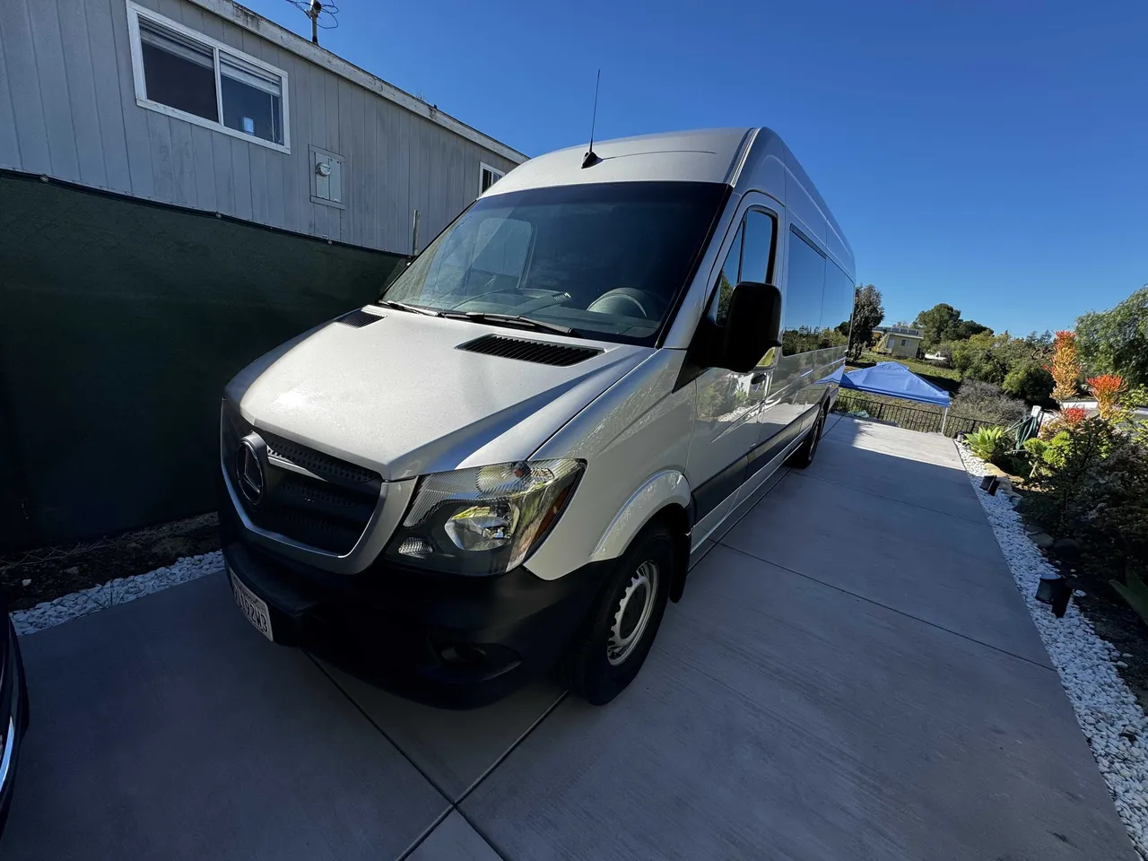 Mercedes-Benz Sprinter Party Limousine Bus (silver) for party bus rental for booking