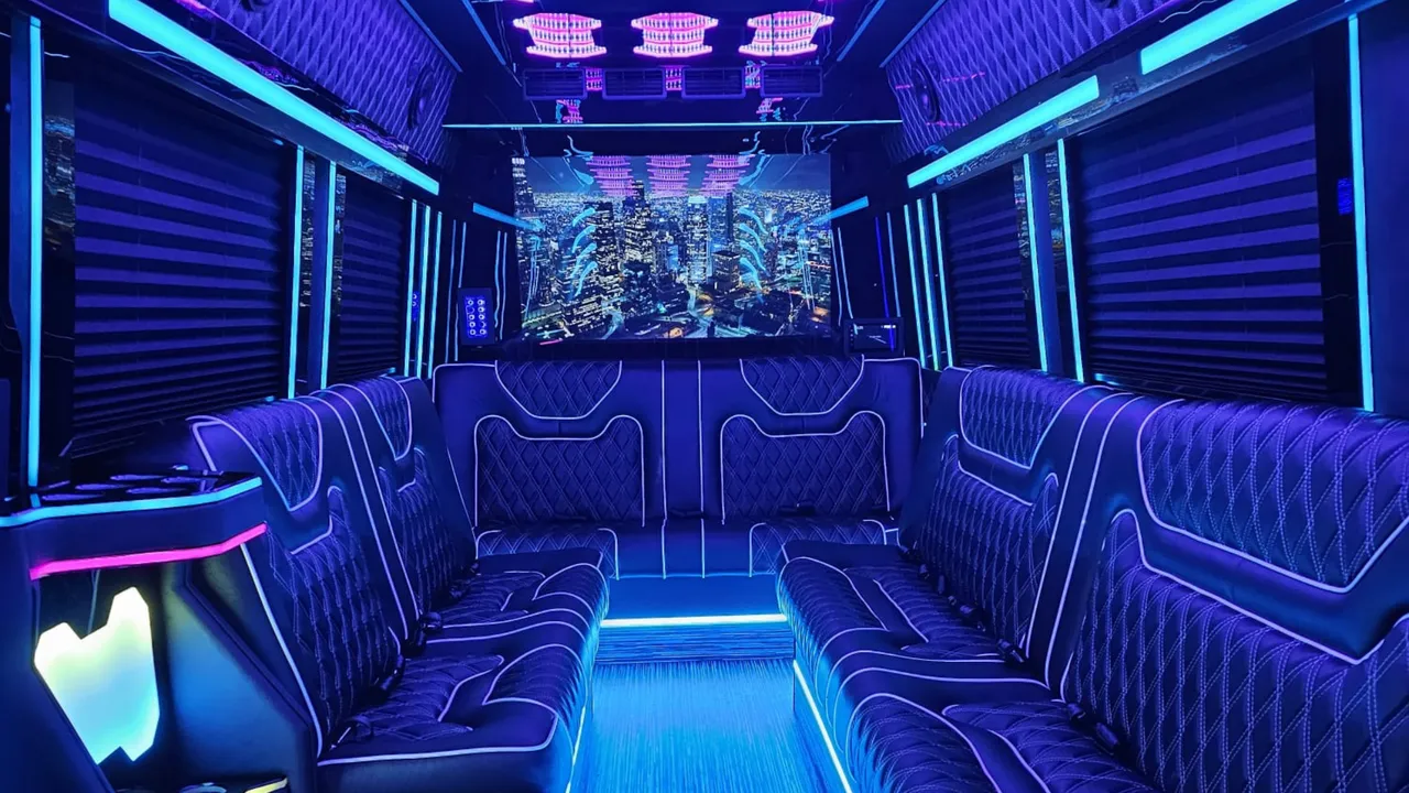 Mercedes-Benz Limousine Sprinter for party bus rental: seating area, with perimeter lounge seating, sofa-style seating and window shades
