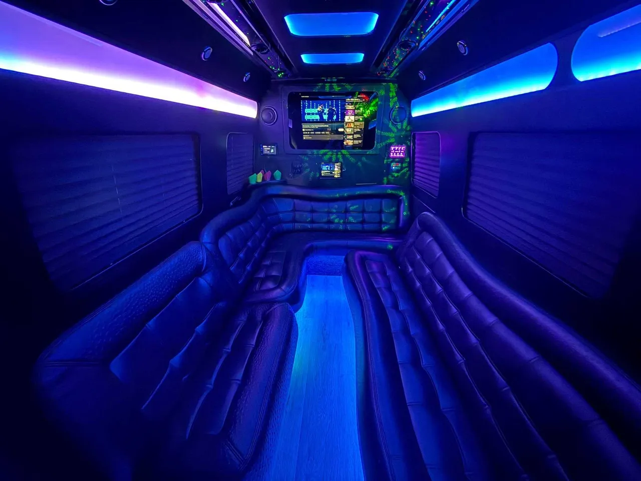 Mercedes-Benz Limousine Sprinter Mercedes-Benz Limousine Sprinter for party bus rental: seating area, with perimeter lounge seating, window shades and LED accent lighting