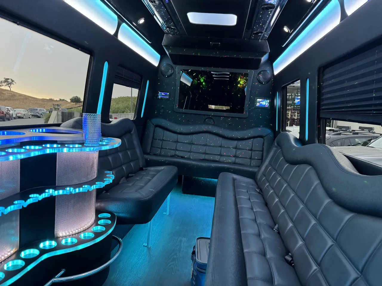 Mercedes-Benz Party Bus: seating area, with perimeter lounge seating, window shades and LED accent lighting, pic 4