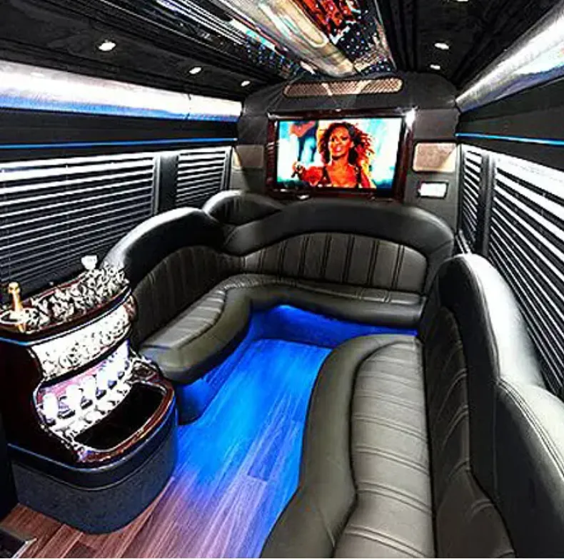 Mercedes-Benz Sprinter Limousine Mercedes-Benz Sprinter Limousine for party bus rental: seating area, with perimeter lounge seating, window shades and LED accent lighting