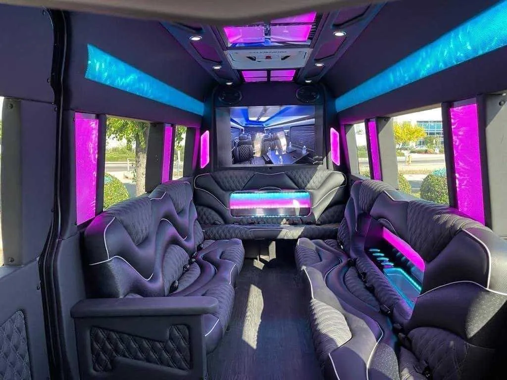 Mercedes-Benz Sprinter Limousine Mercedes-Benz Sprinter Limousine for party bus rental: seating area, with sofa-style seating, LED accent lighting and LED ceiling lighting