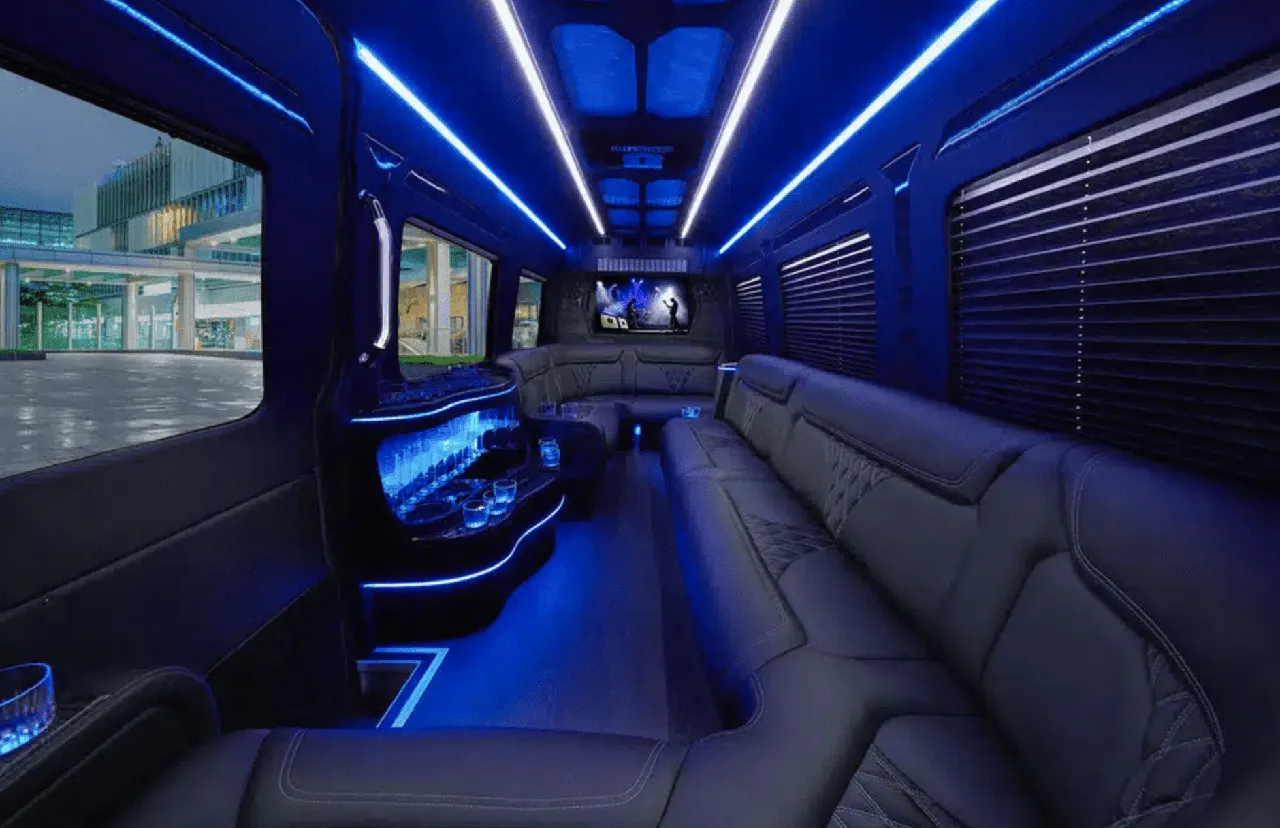 Mercedes-Benz Sprinter Limousine Mercedes-Benz Sprinter Limousine for party bus rental: seating area, with perimeter lounge seating, window shades and LED accent lighting