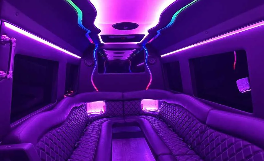 Mercedes-Benz Sprinter Limousine Mercedes-Benz Sprinter Limousine for party bus rental: seating area, with perimeter lounge seating and LED accent lighting