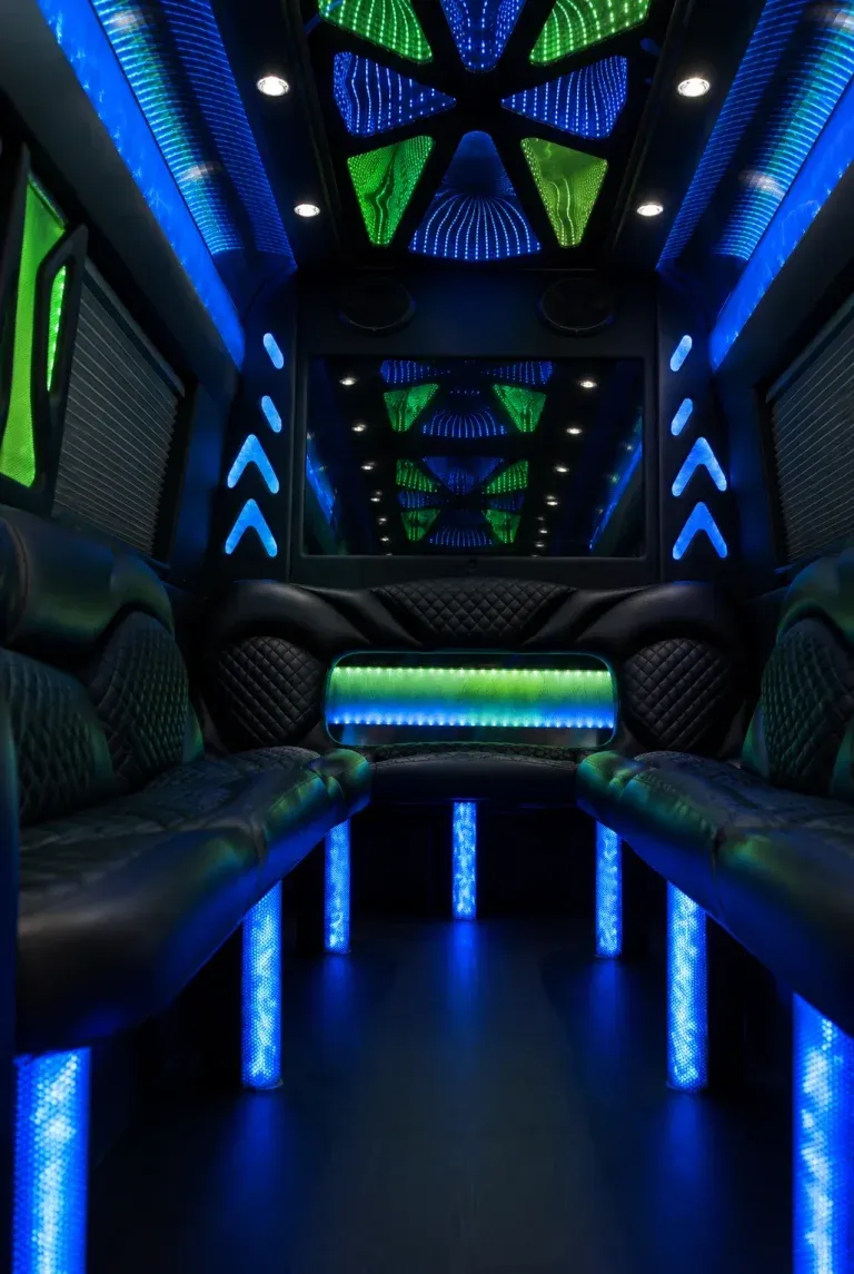 Mercedes-Benz Sprinter Limousine for party bus rental: seating area, with perimeter lounge seating, window shades and LED accent lighting, pic 3