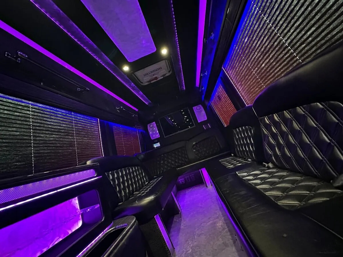 Mercedes-Benz Sprinter XL for party bus rental: seating area, with perimeter lounge seating, window shades and LED accent lighting, pic 2
