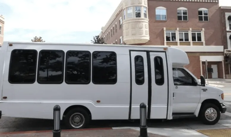 16 Passenger Party Bus (white), with tinted windows
