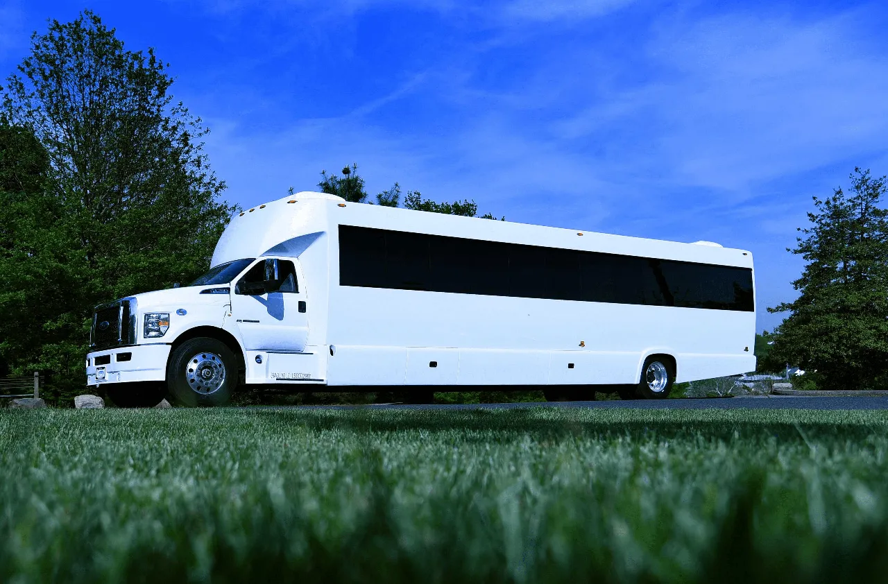 50 Passenger Party Bus (white): full view, with tinted windows