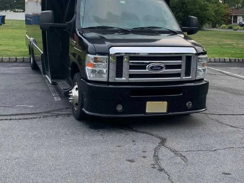 25 Passenger Party Bus (black) for booking