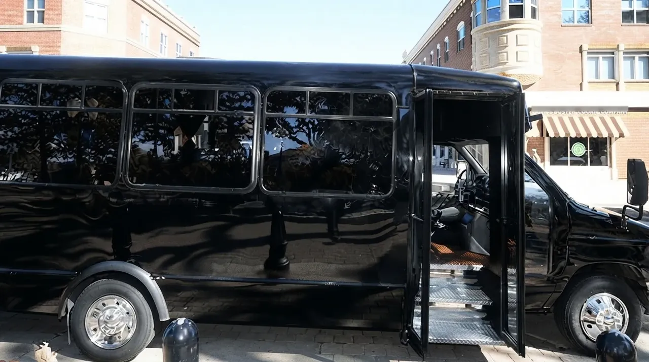 18 Passenger Party Bus (black) for booking