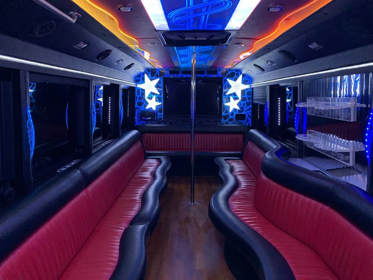 Party Bus - Frank SInatra Party Bus - Frank SInatra: seating area, with perimeter lounge seating, LED accent lighting and LED ceiling lighting